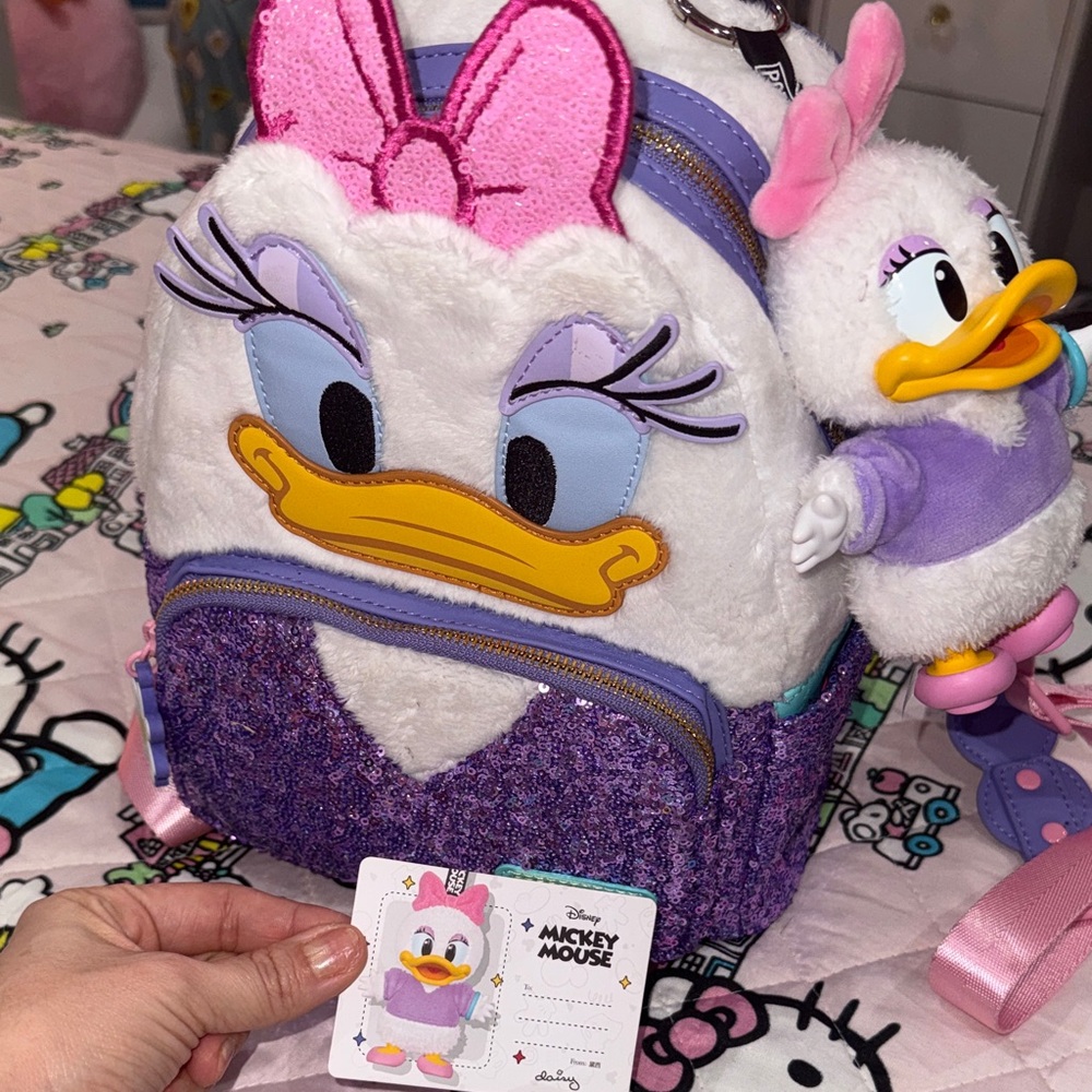 Disney Daisy Duck Plush Backpack with Pink and Purple Accents